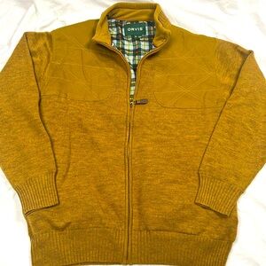 Like New Orvis lined Jacket with patched shoulder and plaid silk lining.